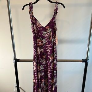 Women’s purple floral jumpsuit. Gianni bini. New. Never worn. Medium. One-piece